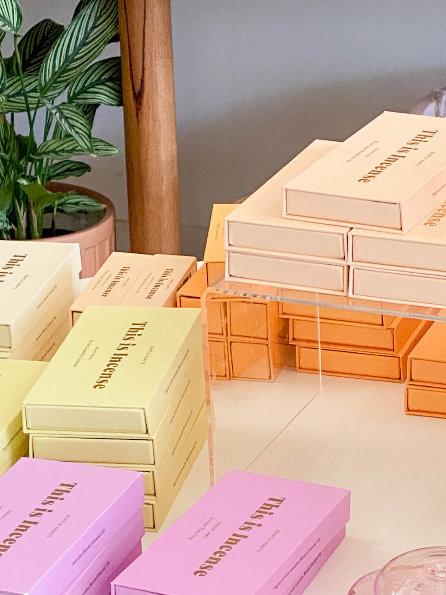 Stacked pastel-colored boxes labeled 